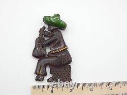 BKL435 Vintage green Bakelite wood Mexican Mariachi figural brooch