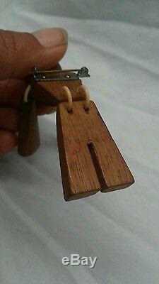 Beautiful vintage carve bakelite wood soldier pin brooch
