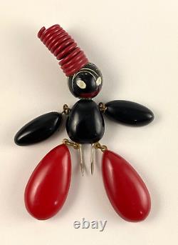 Black and Red Bakelite Blackamoor Dress Clip with Tall Red Hat