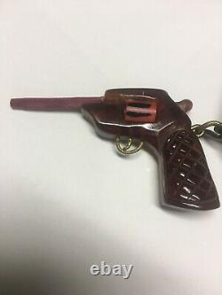 UNUSUAL Bakelite Tortoise Gun w Metal Trigger on Carved Wood Hat Pin Vintage