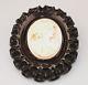 VINTAGE PIN With CARVED SHELL CAMEO ON LARGE OVAL BLACK CARVED BAKELITE BACKGROUND
