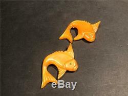 Very Rare Pair of Vintage Carved Butterscotch Swirl Bakelite Fish Pins