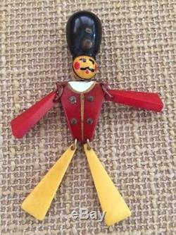 Vintage BAKELITE jointed british soldier man pin