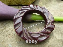 Vintage Bakelite Burgundy Carved Round Locking Clasp Pin (Simichrome tested)