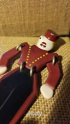 Vintage Bakelite Celluloid Articulated Red Soldier Figural Brooch Pin