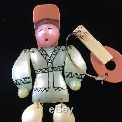 Vintage Bakelite Celluloid Plastic Pin Dancing Man With Guitar