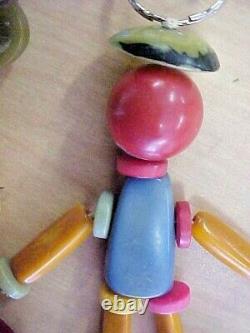 Vintage Bakelite Figure Man Crib Toy Multi Color Dangle & 2 Brooch Pins 1 Shoe