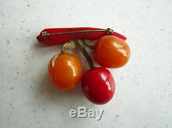 Vintage Bakelite Pin of Berries Hanging from a Red Stem