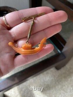 Vintage Carved Butterscotch Bakelite Figural Pin Dangling Brooch NOS Gondola