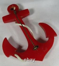 Vintage Cherry Red Carved Bakelite Anchor Pin with metal Studs