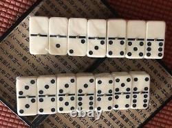 Vintage Chinese dominoes game ivory or Bakelite with brass pin points
