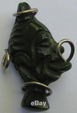 Vintage Dark Green Carved Bakelite & Metal Tribal Ooga Booga Man Pin Brooch