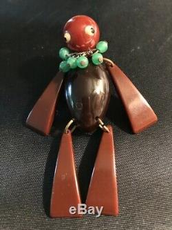 Vintage Rare Jointed Bakelite Pin Tribal Or Hawaiian With Green Lei