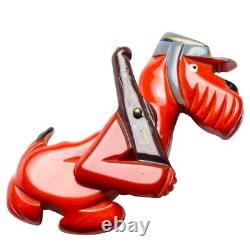 Vintage Red Bakelite Army Soldier Dog with Riffle and Articulated Arm Pin Brooch