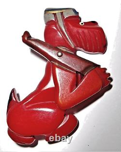 Vintage Red Bakelite Army Soldier Dog with Riffle and Articulated Arm Pin Brooch