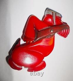 Vintage Red Bakelite Army Soldier Dog with Riffle and Articulated Arm Pin Brooch