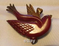 Vintage Red Bakelite Bird on Wood