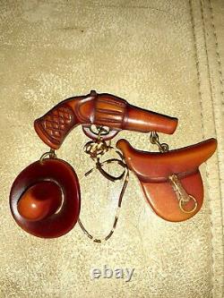 Vintage Western style Bakelite Brooch pin Gun, Saddle, Hat and rope 1930s 1940s