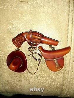 Vintage Western style Bakelite Brooch pin Gun, Saddle, Hat and rope 1930s 1940s